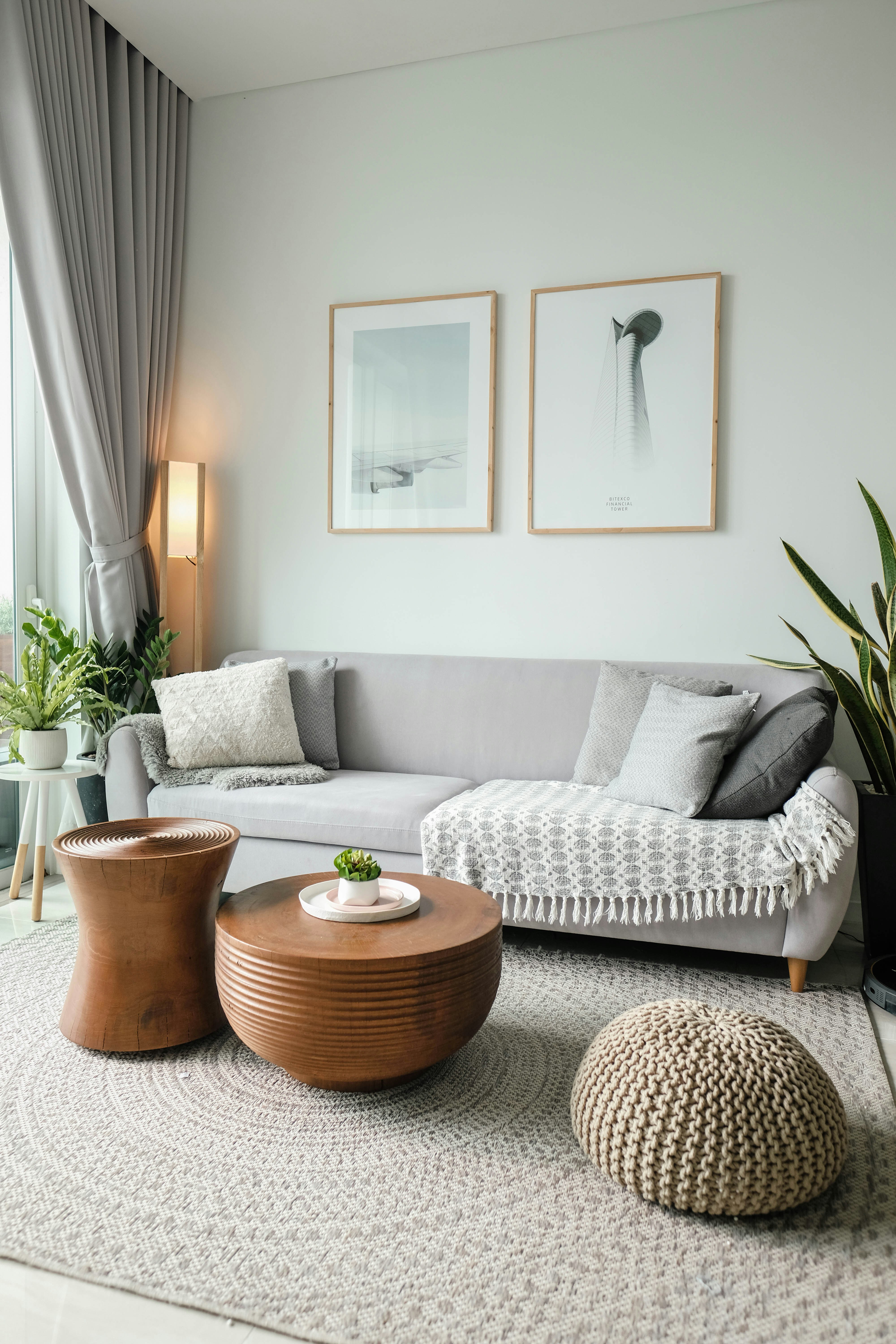 Calm, organized living room with neutral-toned storage and decor